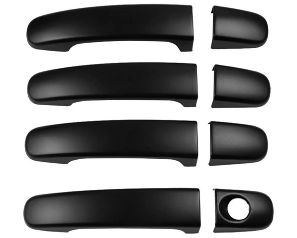 Black car door handle covers are arranged in pairs on a plain white background. Each pair includes a long handle and a shorter round cover with a keyhole cutout on one.