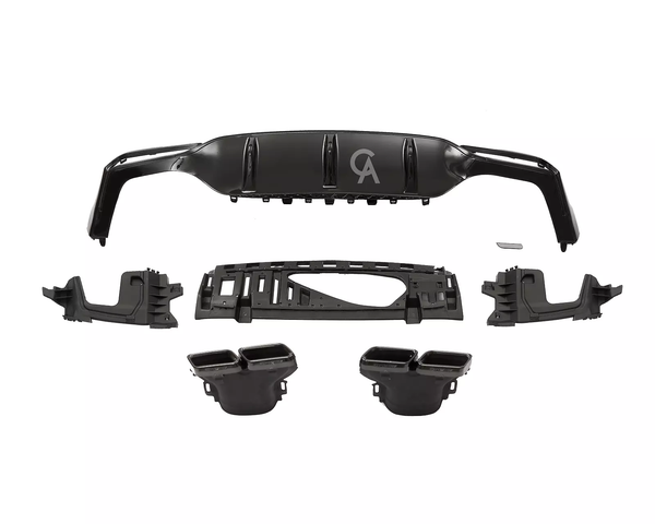 Car components are arranged on a white background. A main black bumper with vents and a "CA" logo is centrally positioned, surrounded by mounting brackets and two exhaust tips.