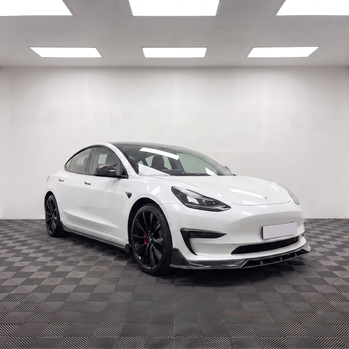 Carbon Fibre Look M Style Wing Mirror Covers fitted to a white Tesla Model 3 | Carbon Accents