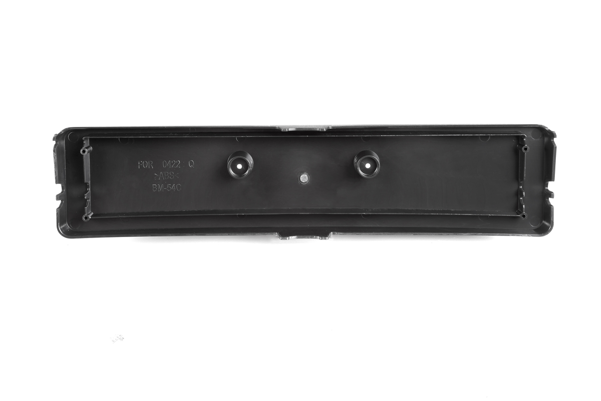 A black rectangular plastic component lies flat, featuring two protruding circular attachments in a plain white environment. Text reads: "FOR 0422 Q ABS BM-54C."