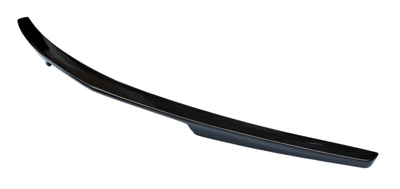 A black car spoiler, smoothly curved and streamlined, sits alone against a plain white background.
