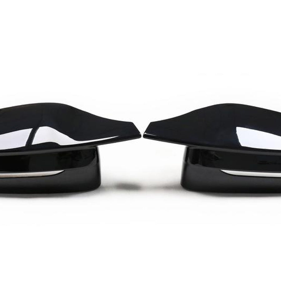 Two glossy black car side mirrors facing each other, set against a plain white background. They have a sleek, aerodynamic design with a subtle chrome accent beneath.