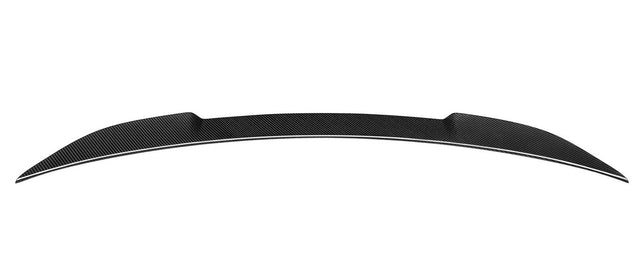 A curved carbon fiber car spoiler, positioned horizontally with tapered ends, displayed against a plain white background.