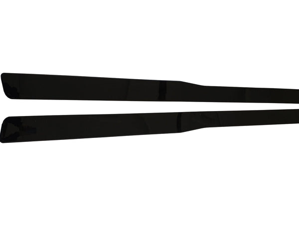 Two black, rectangular helicopter rotor blades lie parallel on a white background, showcasing their sleek, streamlined design and glossy surface.