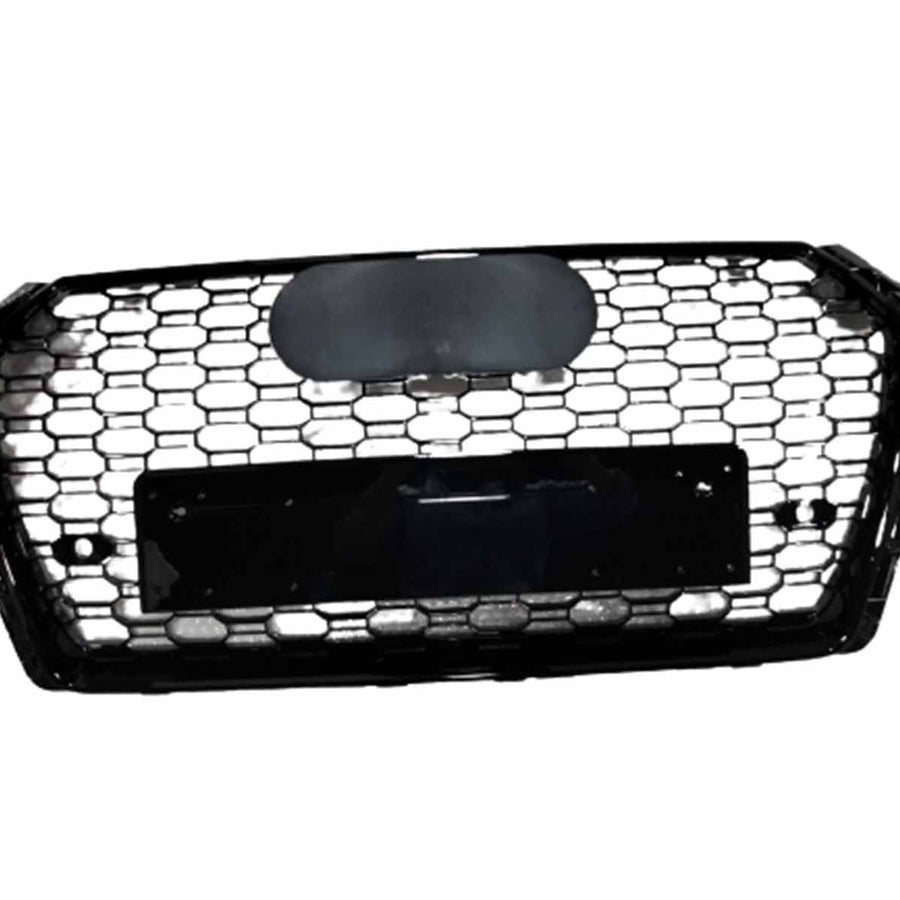 A black honeycomb car grille with a central blank emblem holder and license plate mount, placed against a plain white background.
