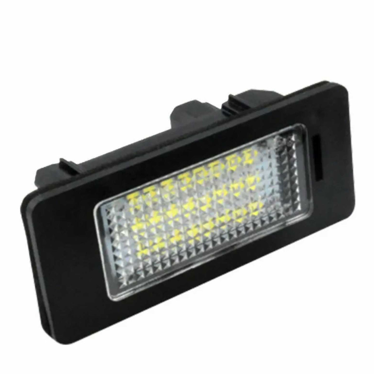 A rectangular LED light illuminates with multiple small bulbs, set in a black plastic casing against a plain white background.