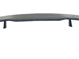 A black car spoiler with an aerodynamic design is positioned horizontally, featuring a central wing supported by three vertical brackets. It is displayed against a plain white background.