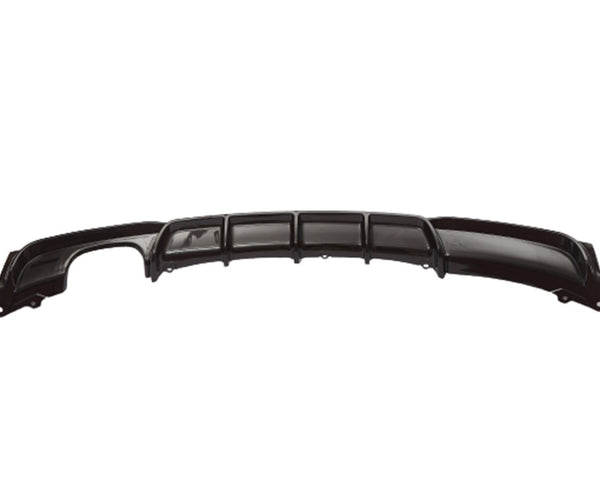 A black automotive rear diffuser with aerodynamic fins, resting against a plain white background, showcasing its sleek design for enhancing vehicle stability.