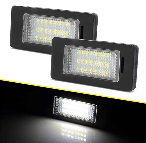 Two rectangular LED lights emit bright white light, enclosed in black frames with a textured surface, displayed against a dark background.