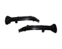 Two black, curved plastic car parts with attachment points rest against a white background, likely designed for vehicle installation or modification.