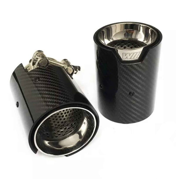 Two black carbon fiber exhaust tips with stainless steel interiors are shown, one upright and the other lying down, showcasing perforated metal inner linings and a logo marked "WII."