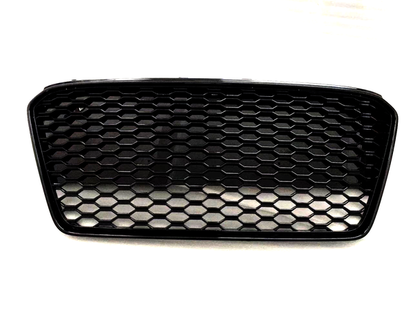 A black, hexagonal mesh car grille, positioned against a plain white background, showcases its open design. The structured pattern suggests it is part of a vehicle's front-end assembly.