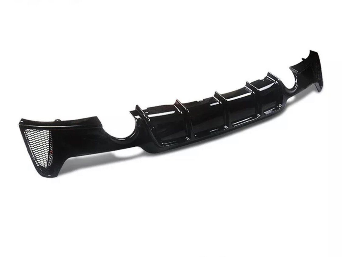 A black car rear diffuser with five vertical fins and mesh sections on both ends, viewed against a plain white background.