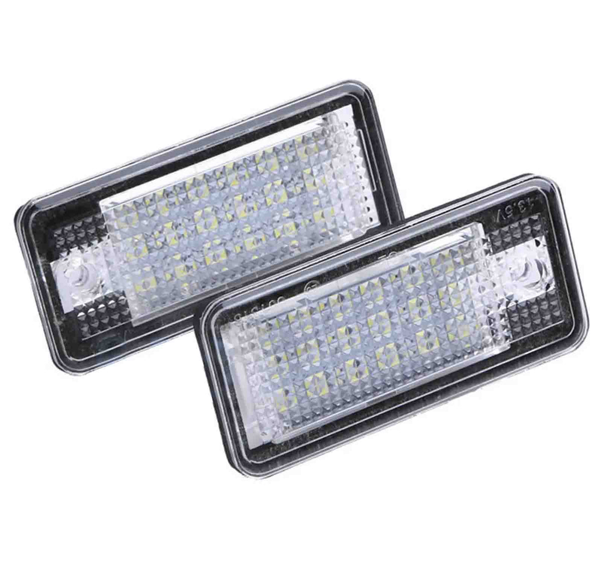 Two rectangular LED lights with a textured surface, positioned overlapping. The units are encased in clear plastic and set against a white background.