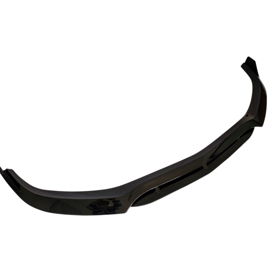 A glossy black car splitter viewed against a plain white background, showcasing its aerodynamic shape with a slightly curved design and mounting brackets.
