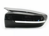 A sleek black side mirror with a chrome strip runs horizontally along its edge, set against a plain white background.
