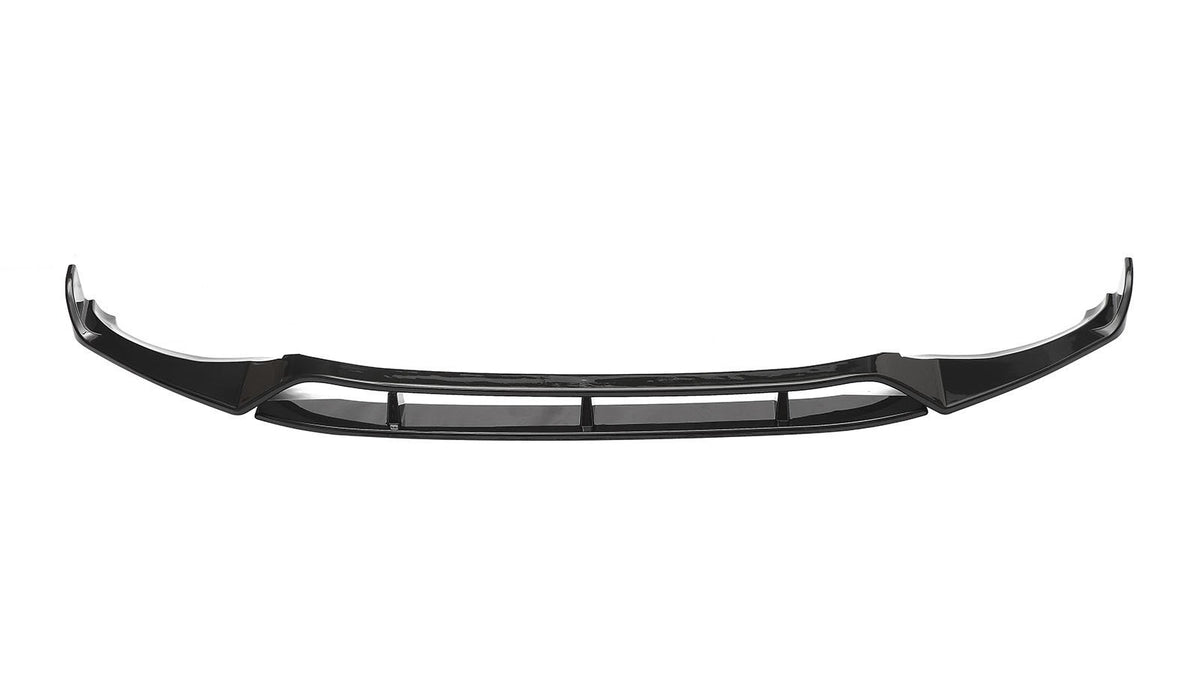 A sleek black car bumper is displayed against a plain white background, featuring angular curves and a central grille section.