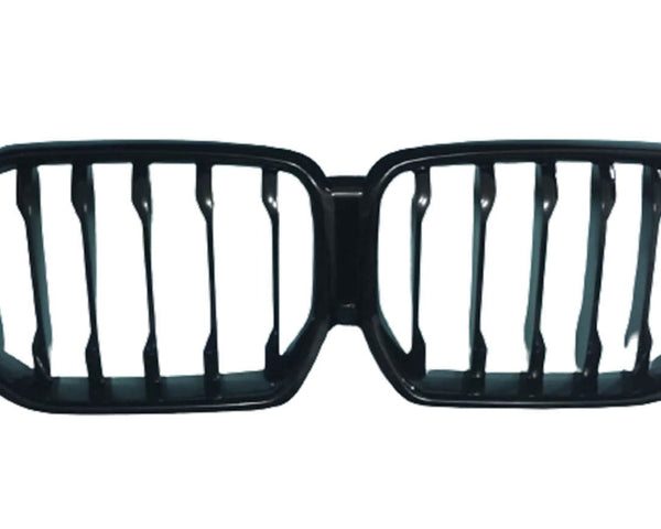 A black automotive grille with a dual-kidney shape, featuring vertical slats. It is isolated on a white background, suggesting it's a part removed for display.