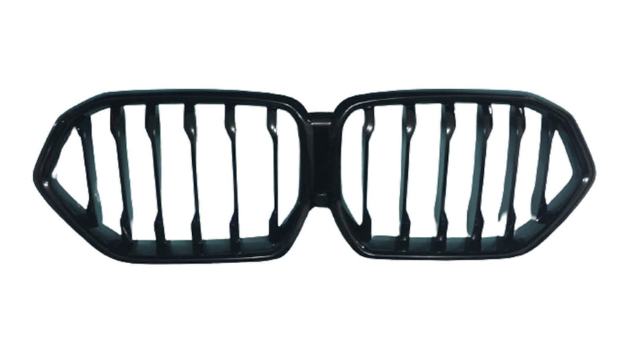 A black automotive grille with a dual-kidney shape, featuring vertical slats. It is isolated on a white background, suggesting it's a part removed for display.
