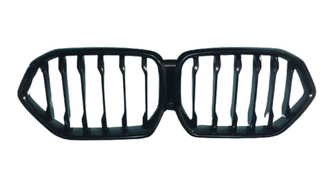 A black automotive grille with a dual-kidney shape, featuring vertical slats. It is isolated on a white background, suggesting it's a part removed for display.