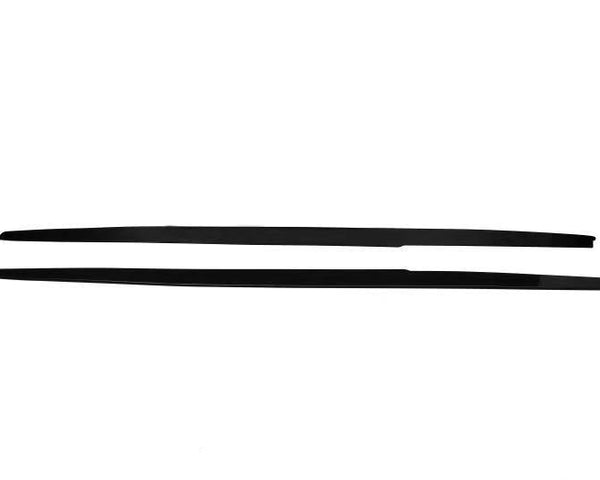 Two long, black, narrow strips lie parallel on a plain white background, appearing as simple lines with tapered ends. No text is present.