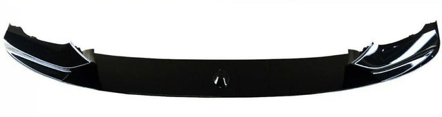 A black car bumper lip spoiler is shown, designed for aerodynamic enhancement. It is sleek and curved, with a glossy finish, positioned against a plain white background.