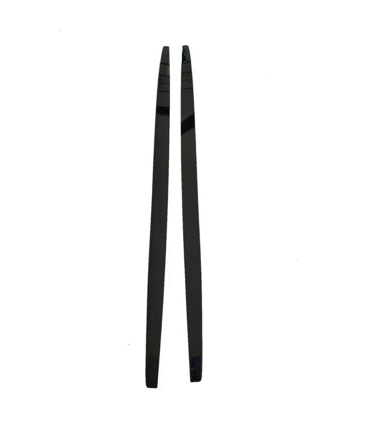 Two black, shiny chopsticks are positioned parallel to each other on a plain white background. The chopsticks are straight, slender, and taper towards one end.