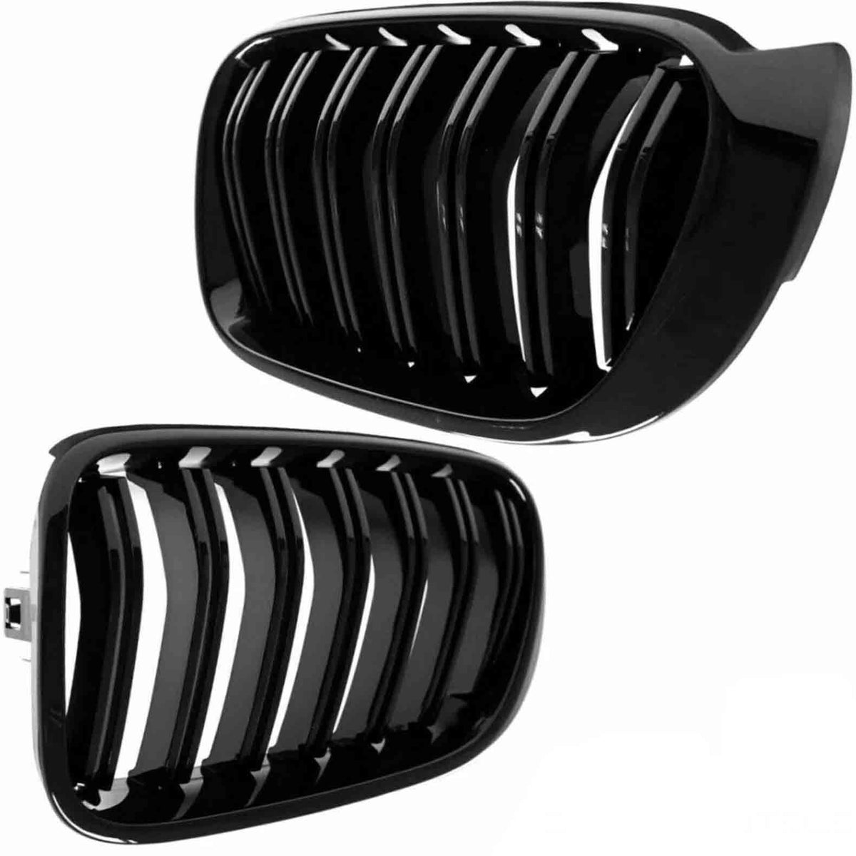 Two glossy black car grilles with vertical slats are displayed against a plain white background, showing different angles of each grille.