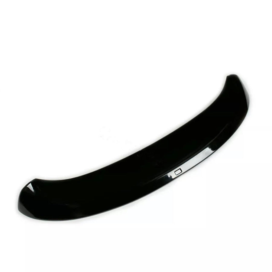 A shiny black car spoiler curves upward, designed to improve aerodynamics, set against a plain white background.