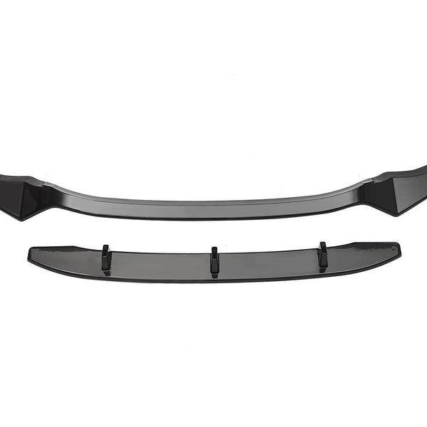 Black car front lip spoiler, resting on a white background, consisting of a curved main piece with end attachments and a separate straight component below, likely intended for enhanced aerodynamics.