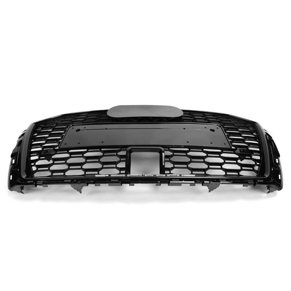 A black car grille features a honeycomb pattern and a rectangular central section, positioned against a plain white background.