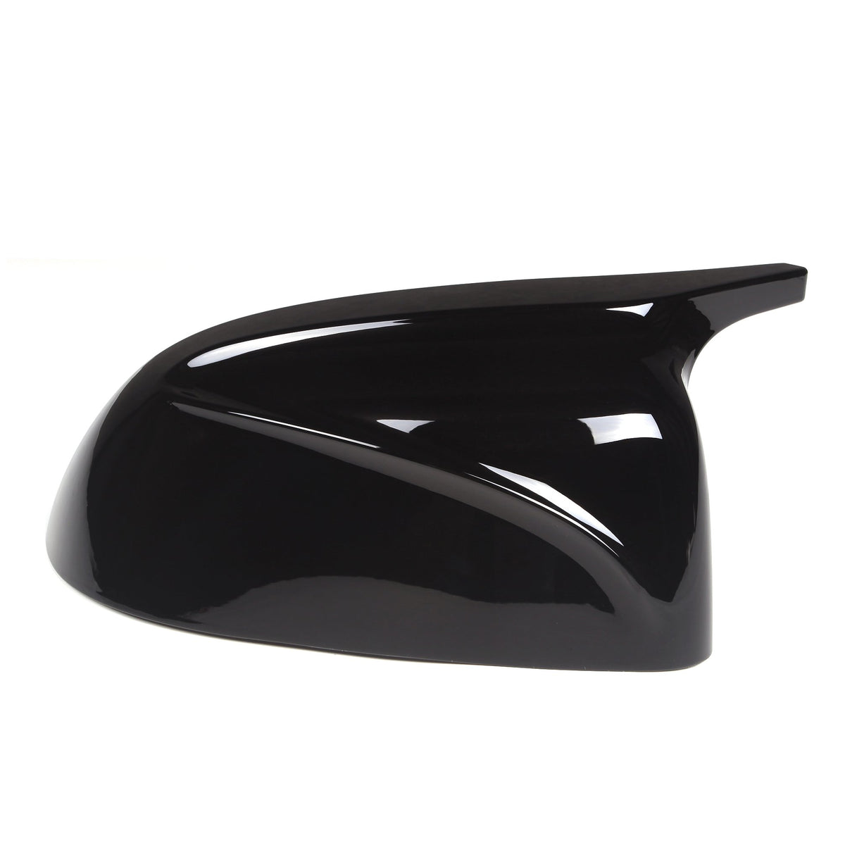 A glossy black side mirror cover with smooth, aerodynamic curves, rests against a plain white background, reflecting light on its surface.