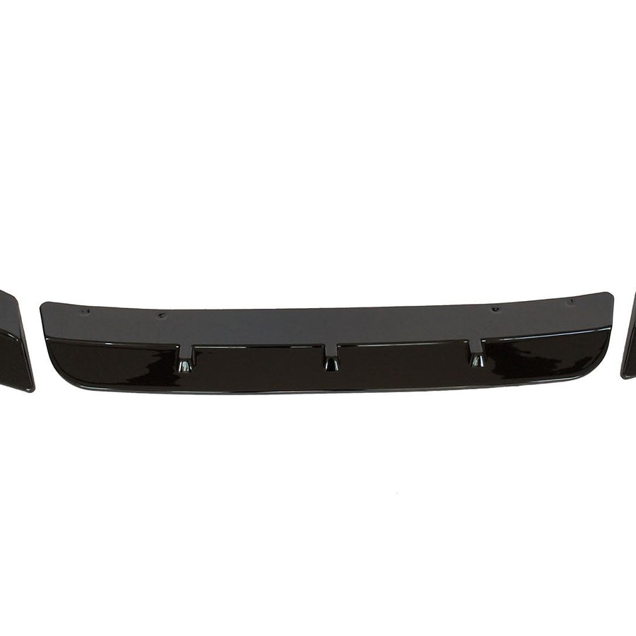 Three black car bumper parts, including a central spoiler and two end pieces, are aligned horizontally on a white background, suggesting an automotive component layout.