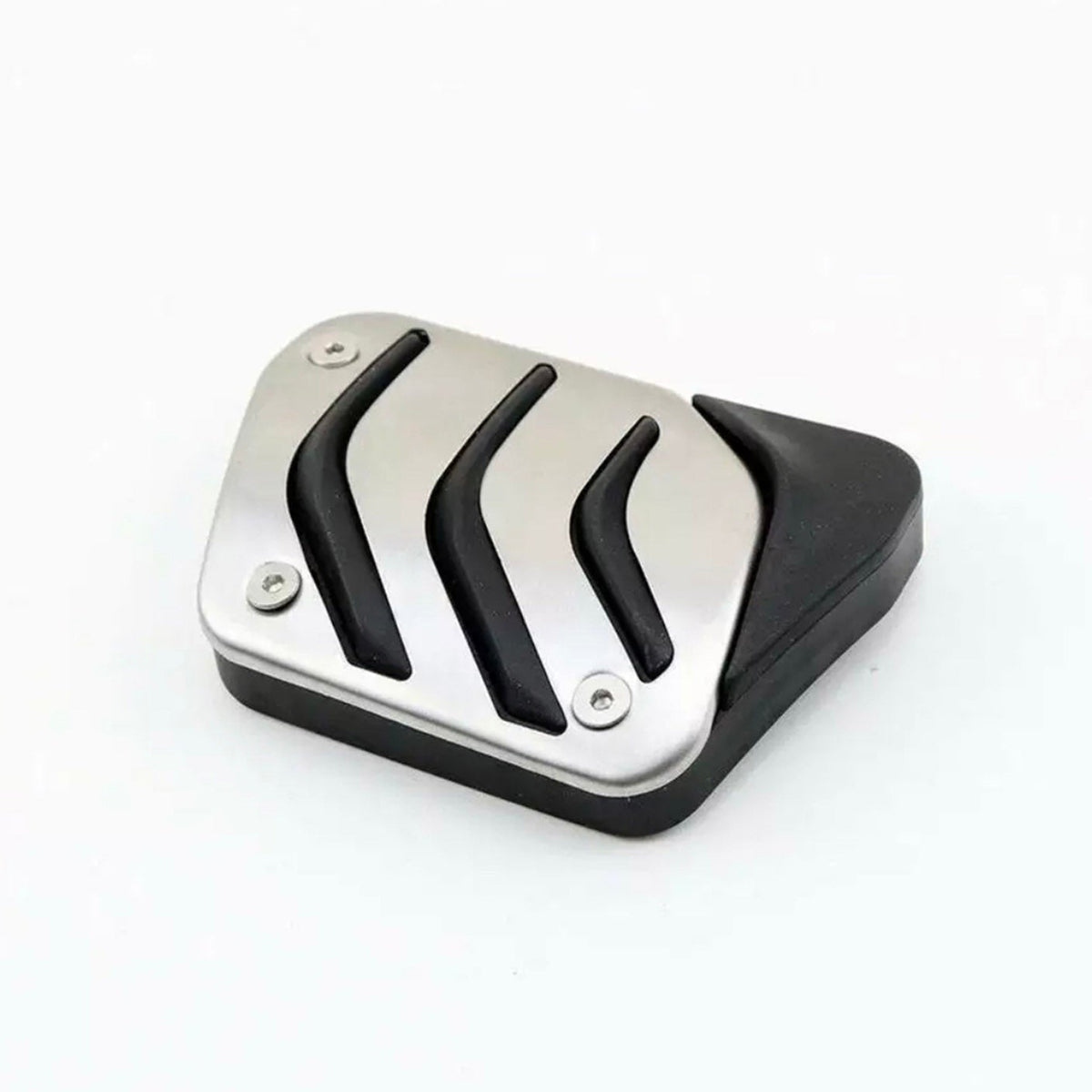 Rectangular metal and rubber car pedal with three curved rubber grips, secured by screws, resting on a clean, white surface.