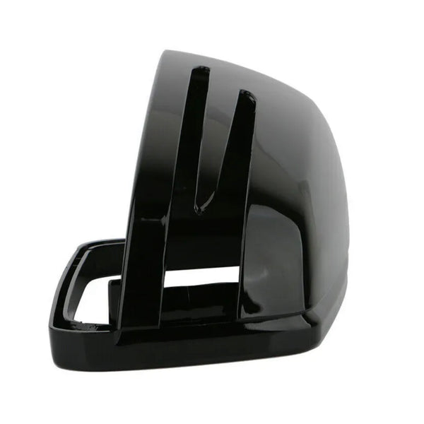 A sleek black plastic bread slicer guide, angled with vertical slots for consistent slicing, rests on a plain white background.