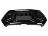 A black car grille with a hexagonal mesh pattern, featuring the word 