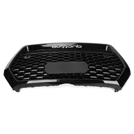 A black car grille with a hexagonal mesh pattern, featuring the word "quattro" at the top, laid on a plain white background.