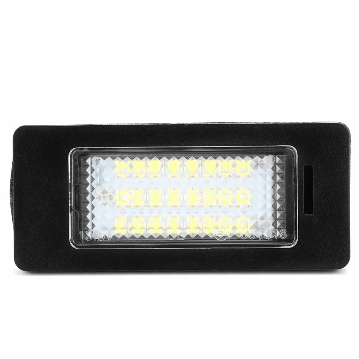 A rectangular LED light panel sits in a black housing, featuring multiple small, yellow LED bulbs arranged in rows, set against a white background.