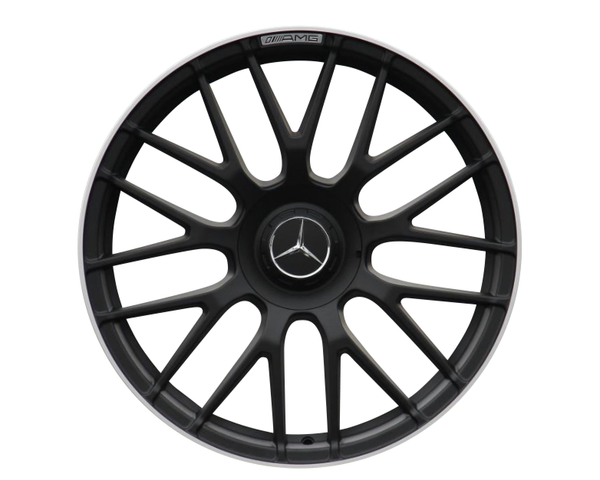 A black multi-spoke car wheel rim features a central Mercedes-Benz logo with the text "AMG" on the edge, set against a plain white background.