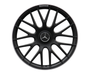 A black multi-spoke car wheel rim features a central Mercedes-Benz logo with the text "AMG" on the edge, set against a plain white background.