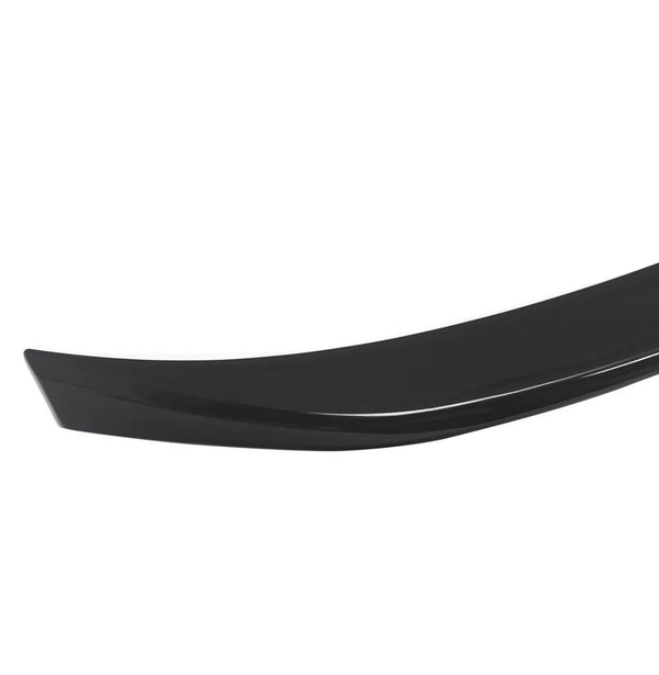A sleek, curved black car spoiler, positioned on a plain white background, highlighting its aerodynamic design with smooth surface and contoured edges.