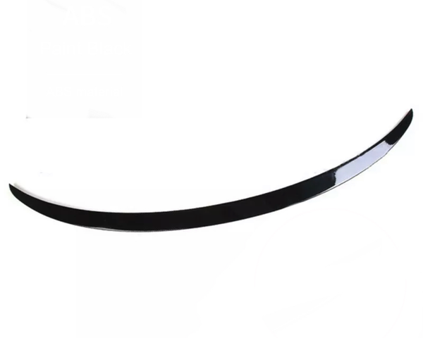 A black, curved spoiler lies on a plain white background, showcasing a glossy finish.
