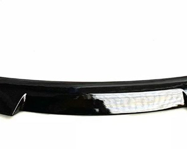 A black car spoiler with a glossy finish is positioned horizontally on a plain white background. The design is sleek, slightly curved, and features a central reflective strip.