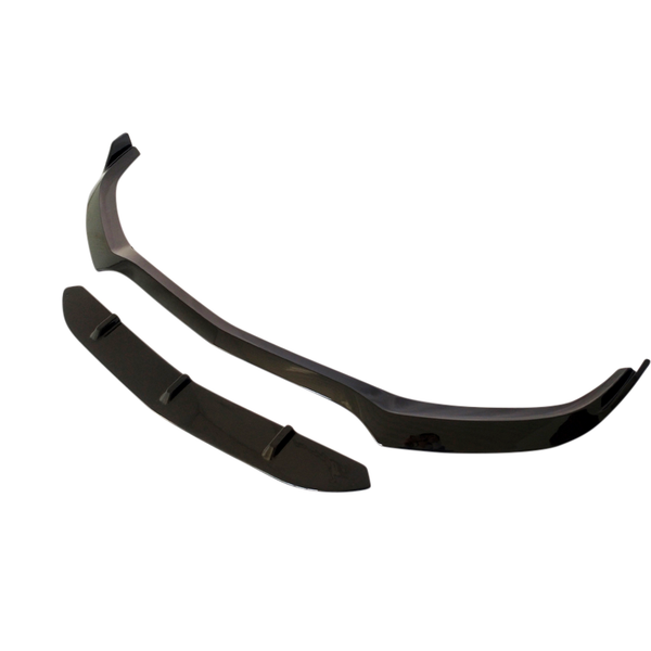 A black car spoiler, consisting of two components, is displayed against a plain white background. The spoiler pieces have a smooth, aerodynamic design.