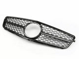 A black car grille with a diamond-patterned mesh and a circular center frame lies on a plain white background.