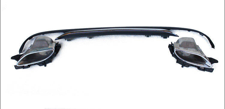 Three car headlight housings are arranged on a white background. Two identical units are placed symmetrically with a long, curved center piece connecting them, likely part of a vehicle's lighting system.