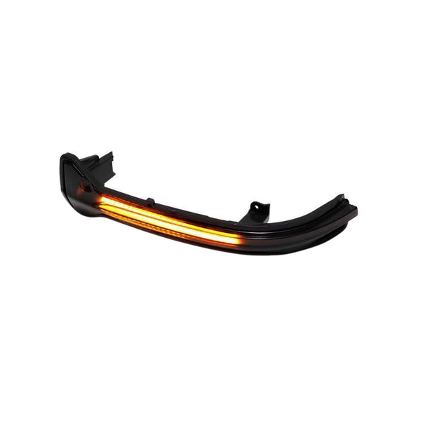 A curved car side mirror LED turn signal emits amber light, positioned against a plain white background.