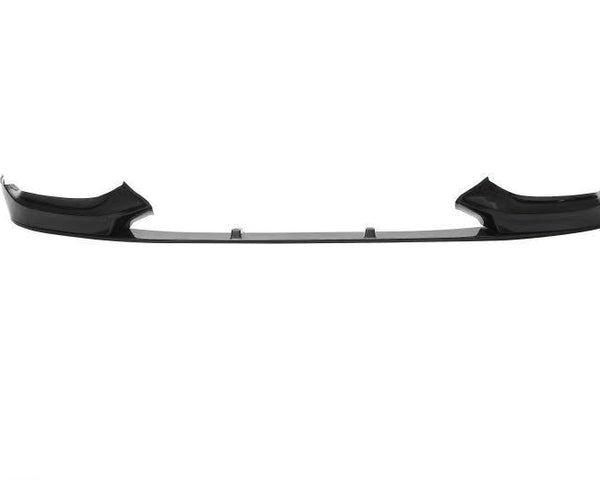 A black car front lip spoiler, elevated slightly, spans horizontally against a plain white background, suggesting aerodynamic enhancement for vehicle performance.
