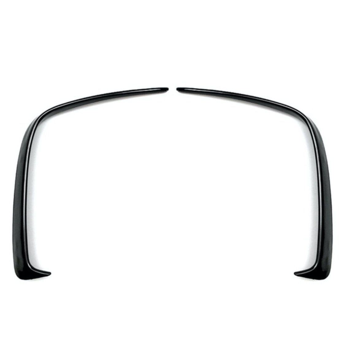 Two curved black plastic fender flares symmetrically facing each other, positioned on a plain white background.