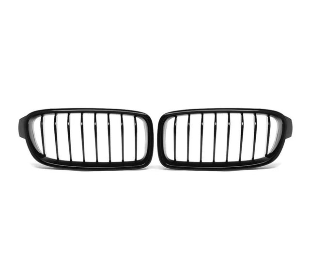 A pair of black, vertical-bar car grilles is placed on a plain white background, positioned side by side.
